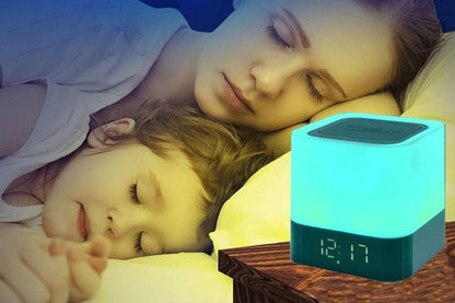 Compact LED bedside lamp with speaker, clock display and touch sensor top