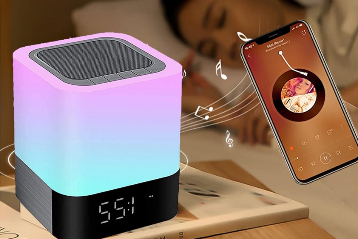 Compact LED bedside lamp with speaker, clock display and touch sensor top