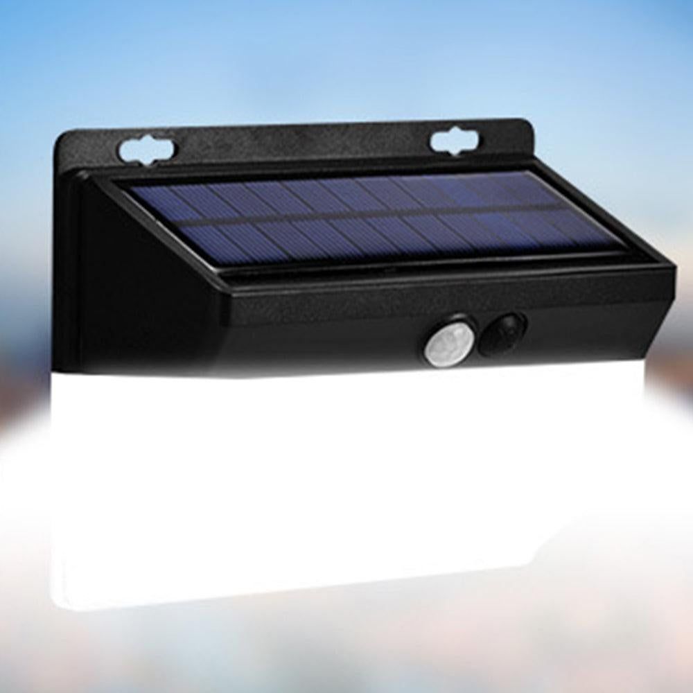 Black solar wall light with motion sensor and LED panel for outdoor use