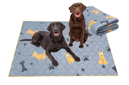 Two light grey washable dog training pee pads with dog pattern