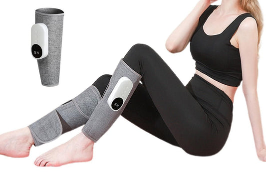 Grey heated leg massager with wraparound design and hook and loop closure