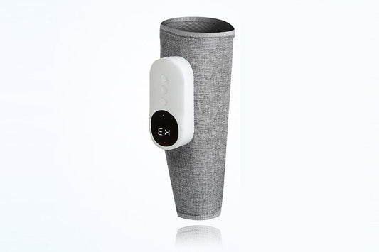 Grey heated leg massager with wraparound design and hook and loop closure