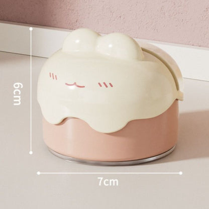 Pink suction cup knife sharpener locked to a kitchen benchtop