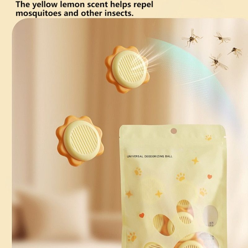 Grey sunflower-shaped deodoriser discs with adhesive backing