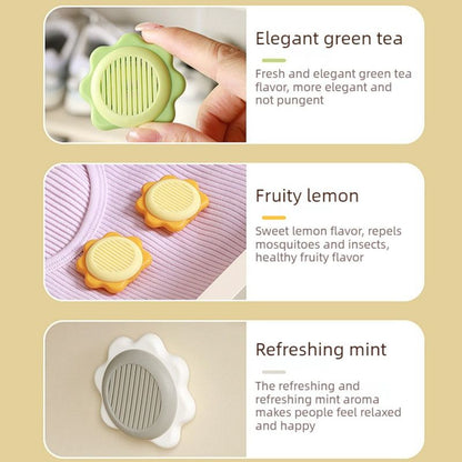 Grey sunflower-shaped deodoriser discs with adhesive backing