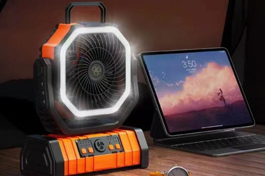 Orange rechargeable camping fan with built-in LED light and hanging hook