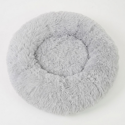 Round faux fur heated pet bed with USB lead and non-slip base