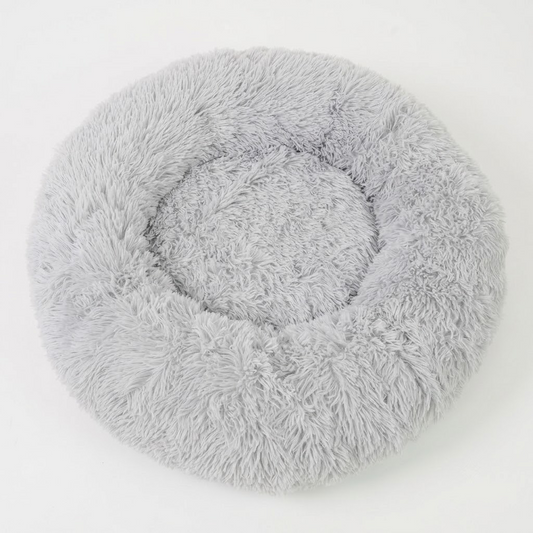 Round faux fur heated pet bed with USB lead and non-slip base