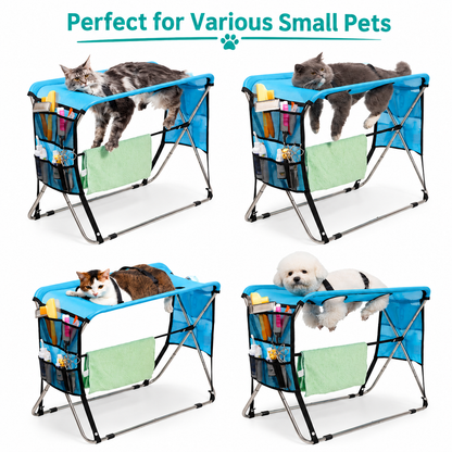 Pink foldable pet grooming table with mesh top, restraint strap and towel bar