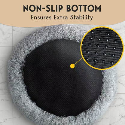 Navy plush donut pet bed with raised rim for cats and dogs