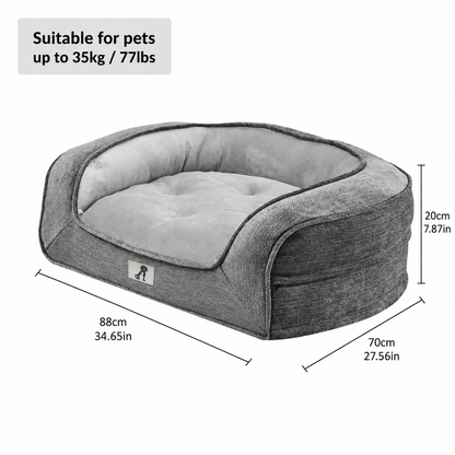 Pink orthopaedic pet sofa bed with bolstered edges and a removable cover