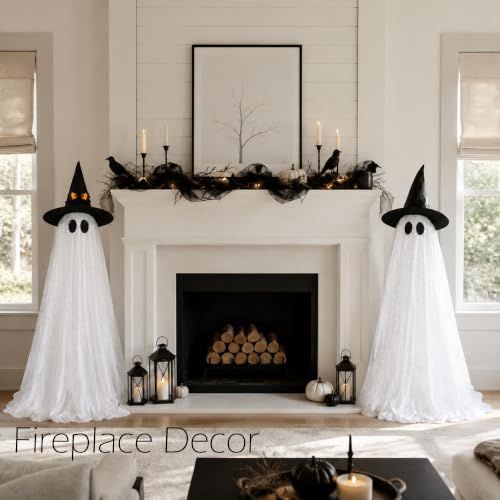 Tall standing white Halloween ghost decorations lit from within on a porch