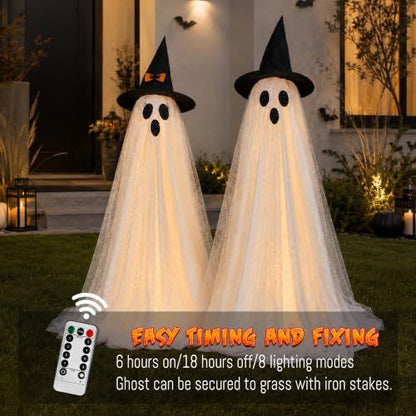 Tall standing white Halloween ghost decorations lit from within on a porch
