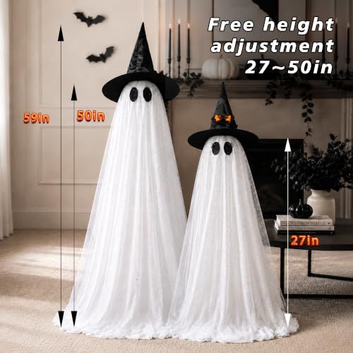 Tall standing white Halloween ghost decorations lit from within on a porch