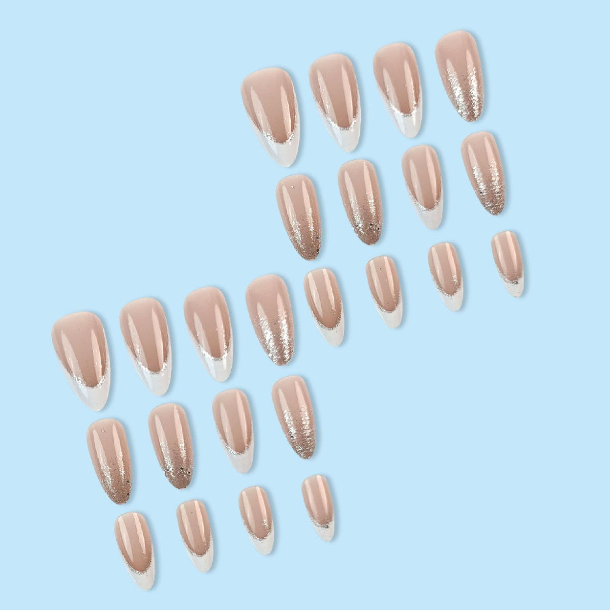 Set of nude pink press-on nails with glossy finish and glitter tip designs