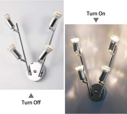 Chrome four head LED track lighting bar mounted on a ceiling