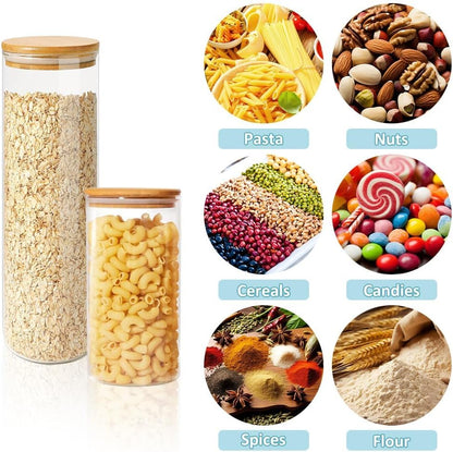 Twelve clear glass storage jars with bamboo lids in assorted sizes for pantry organisation