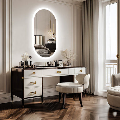 Oval wall-mounted LED bathroom mirror with illuminated frame