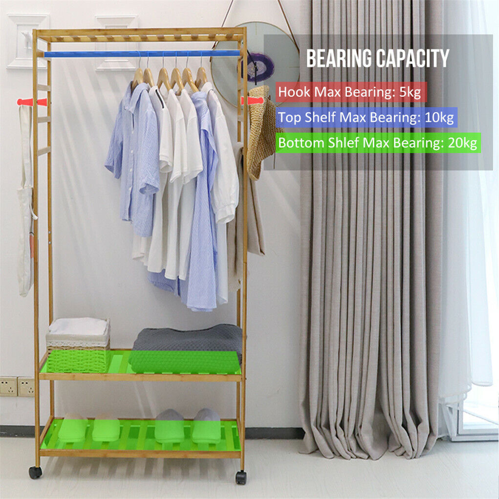 Three-tier bamboo clothes rack on wheels with side hooks and shelves