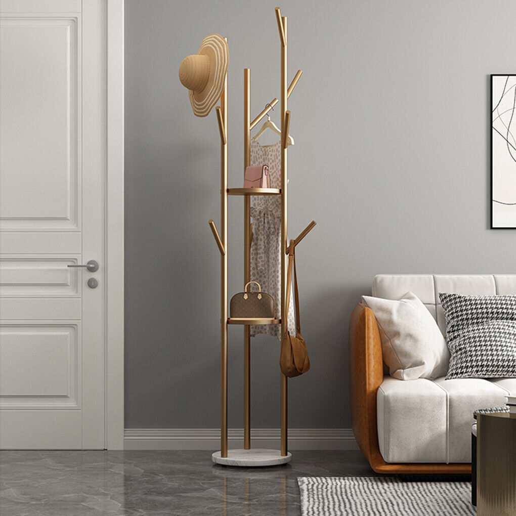 Tall marble and metal coat rack stand with gold frame, marble base and multiple hooks
