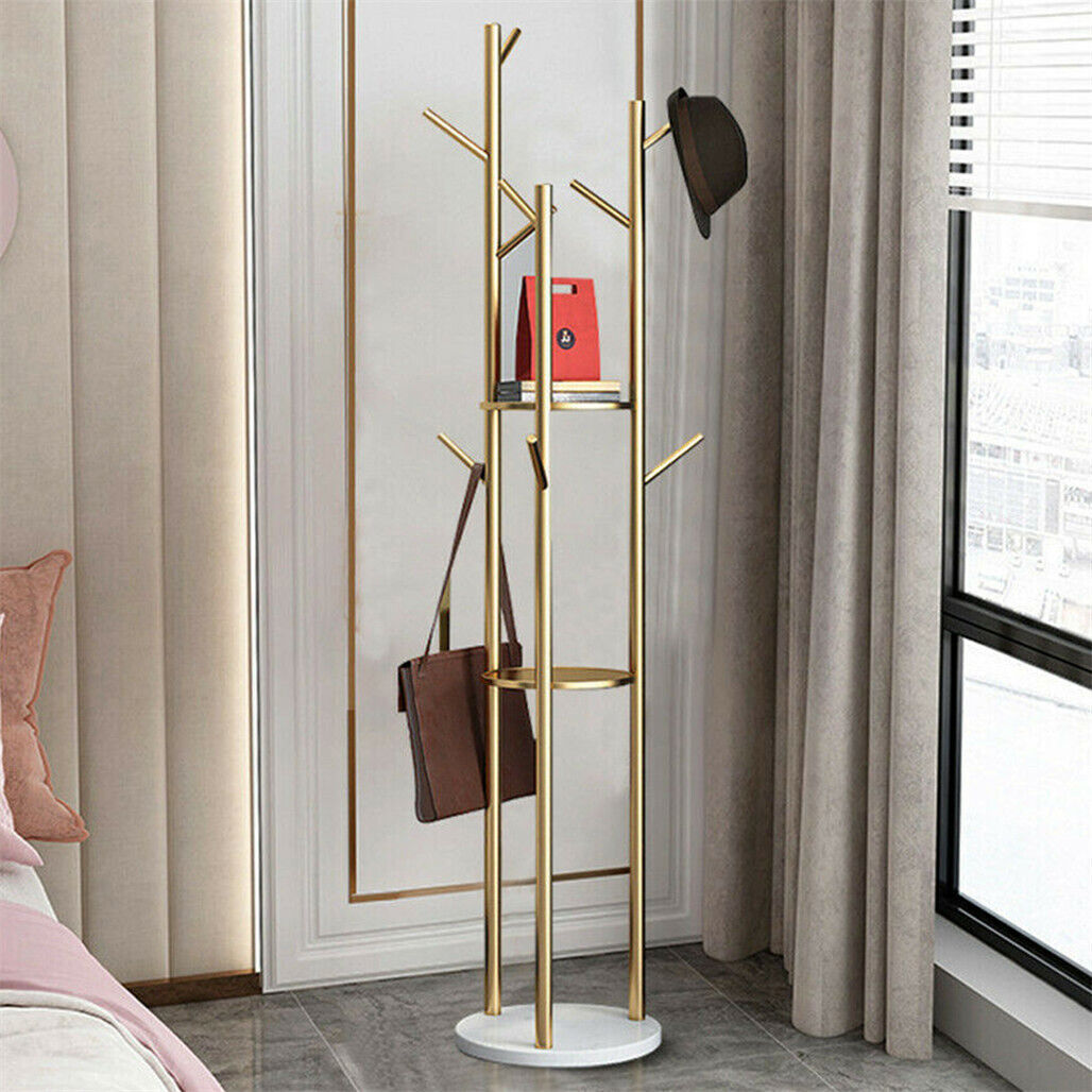 Tall marble and metal coat rack stand with gold frame, marble base and multiple hooks