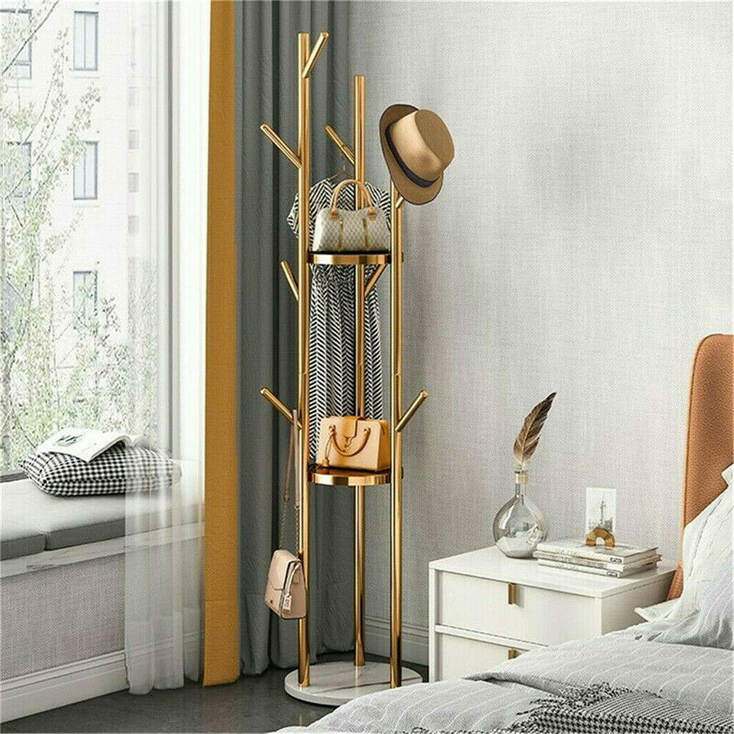Tall marble and metal coat rack stand with gold frame, marble base and multiple hooks