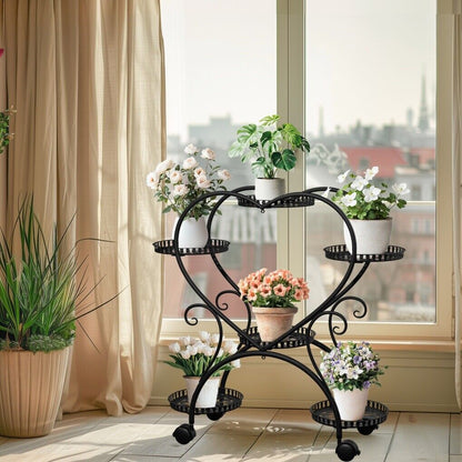 Rolling metal plant stand with wheels and heart-shaped shelf for six pots