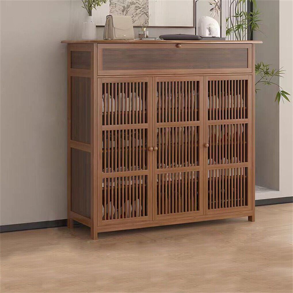 Four tier wooden shoe cabinet with three slatted doors and a drawer