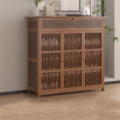 Four tier wooden shoe cabinet with three slatted doors and a drawer