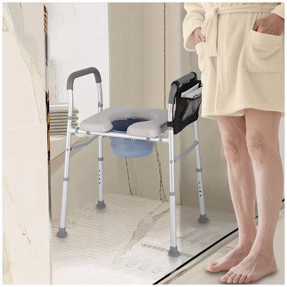 White heavy duty bedside commode chair with padded seat and armrests