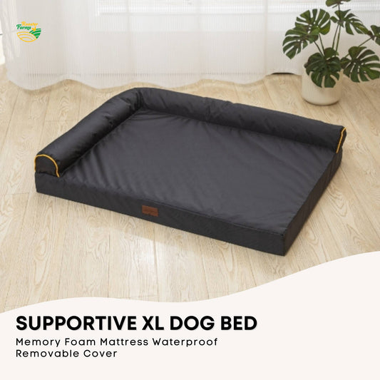 Grey waterproof orthopaedic dog bed with L-shaped bolster and orange trim