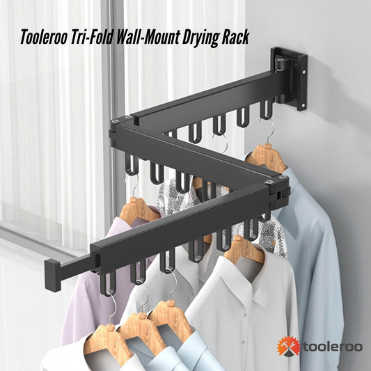 Black tri-fold wall-mounted clothes drying rack folded open with multiple hanging arms