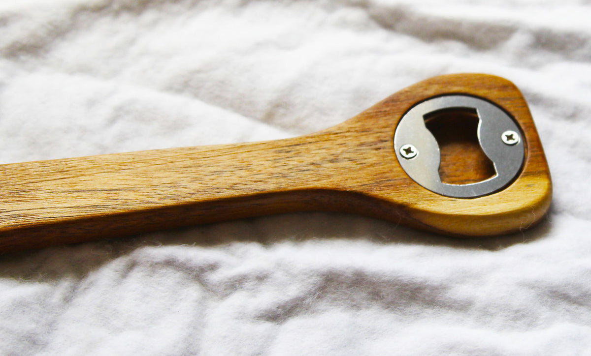 Pack of wooden spoon bottle openers with leather hang straps