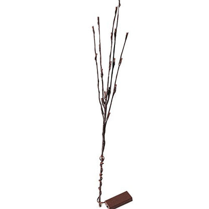 LED branch stems with warm white bulbs arranged as a table centrepiece