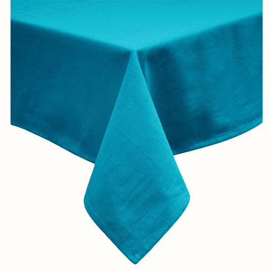 Blue bird patterned cotton blend table cloth on a long dining table