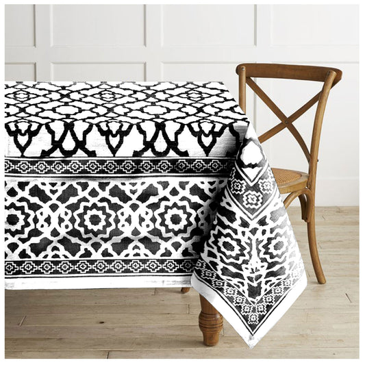 Black vintage cotton rectangle tablecloth laid flat on a dining table