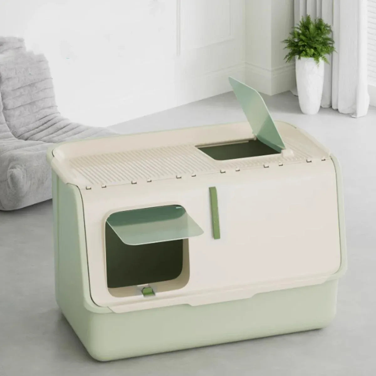 Green fully enclosed cat litter box with lid and front opening