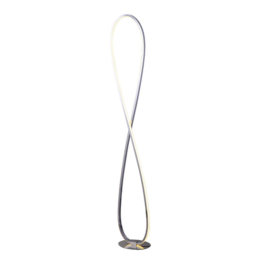 Slim chrome LED floor lamp standing in a living room corner