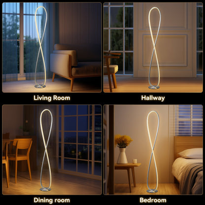 Slim chrome LED floor lamp standing in a living room corner