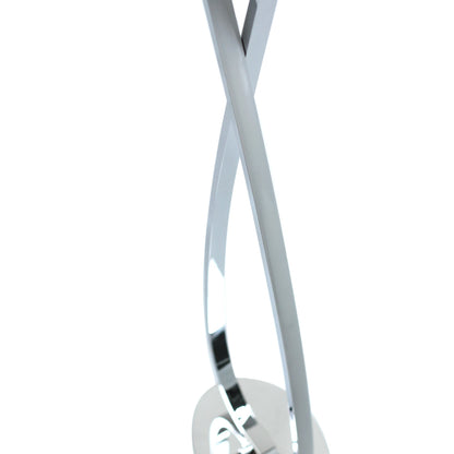 Slim chrome LED floor lamp standing in a living room corner