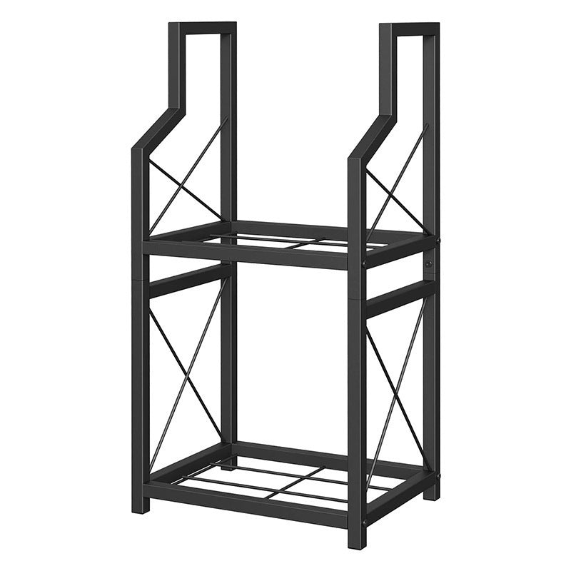 Two tier black metal firewood rack holding split logs beside a fireplace