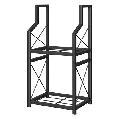 Two tier black metal firewood rack holding split logs beside a fireplace