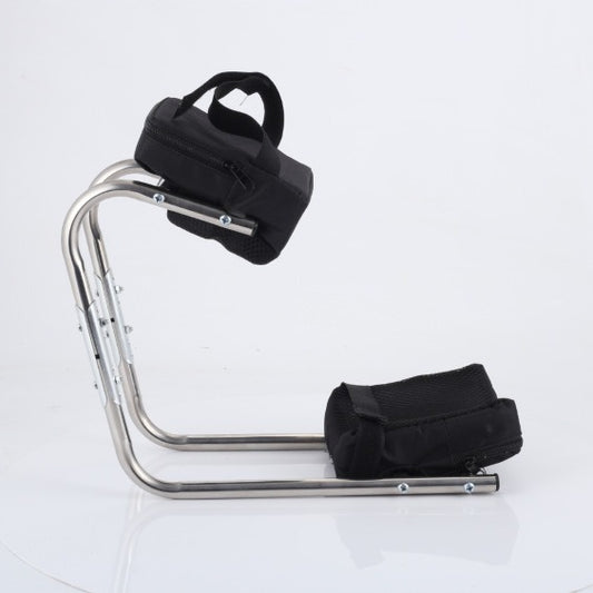 Folding garden kneeler with padded surface and steel handles on a lawn