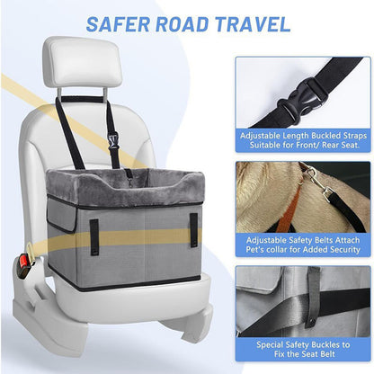 Black portable dog booster seat with plush liner, safety straps and storage pockets