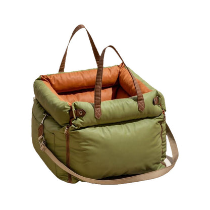 Green and orange plush pet booster car seat with non-slip base and side pocket