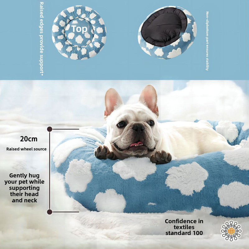 Blue round plush pet bed with white cloud pattern and raised rim