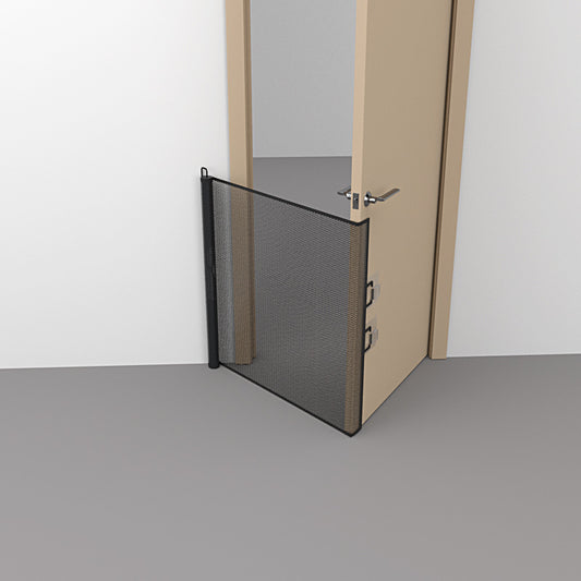 Black retractable mesh pet gate spanning a wide hallway
