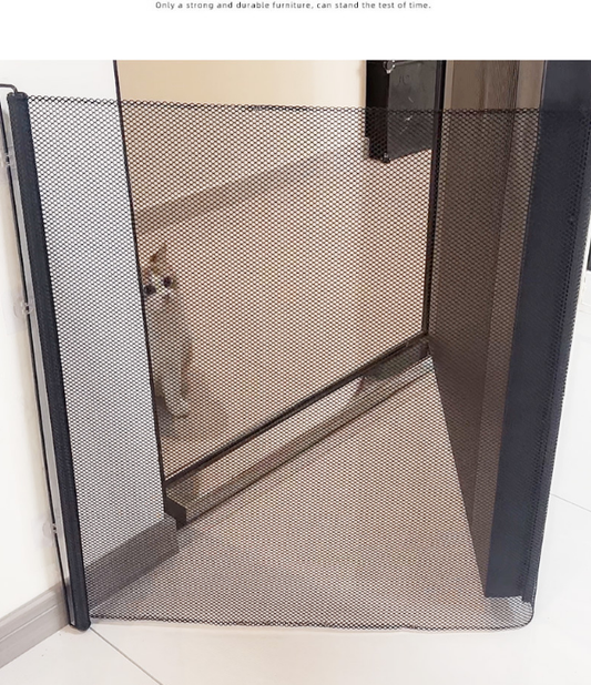 Retractable pet safety gate with paw print mesh across a doorway