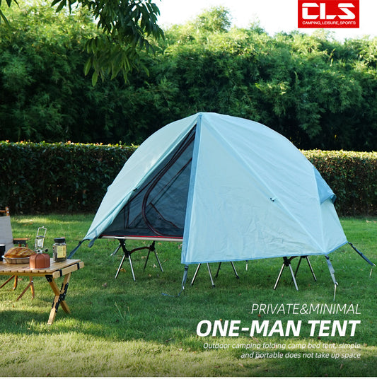 Khaki off-ground camping tent canopy with mosquito net over a camp cot