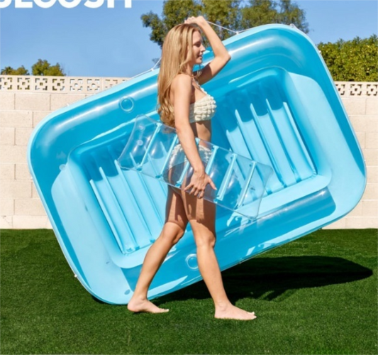 Transparent blue inflatable pool lounger floating with cup holders